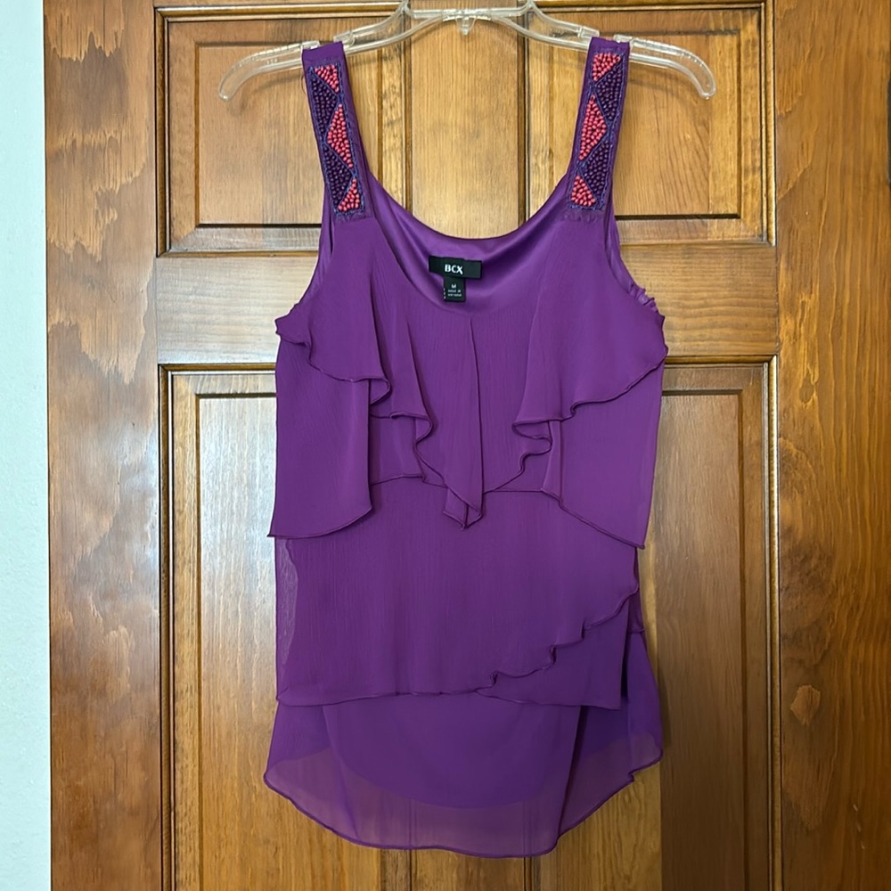 BCX M beautiful blouse with beaded details on the shoulders.